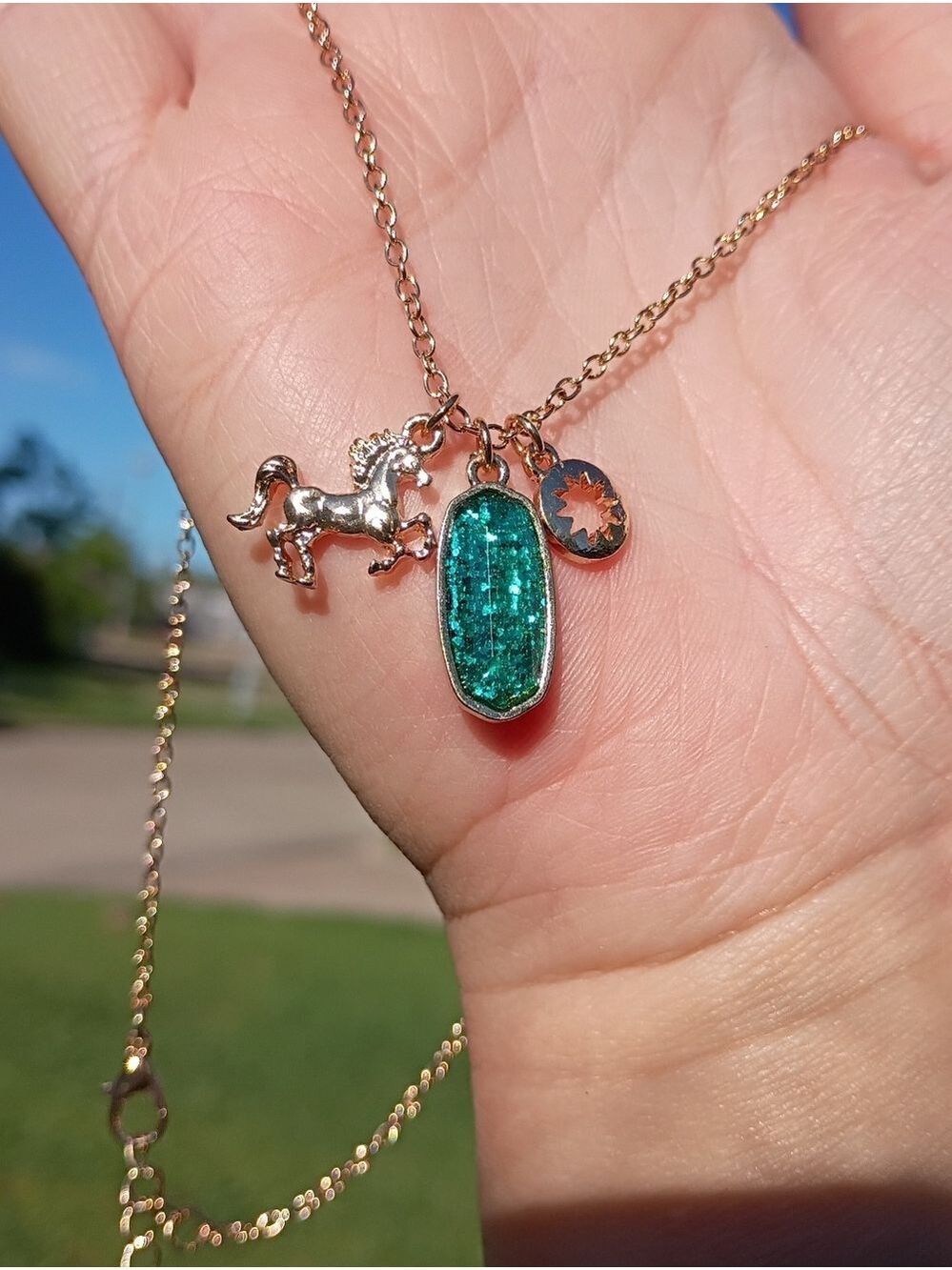 2/$10 December Girl Gold-Tone Necklace with Teal Glitter Pendant and Horse Charm - Picture 6 of 8
